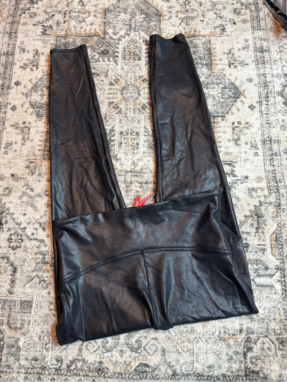 Spanx faux leather leggings in black with a glossy finish